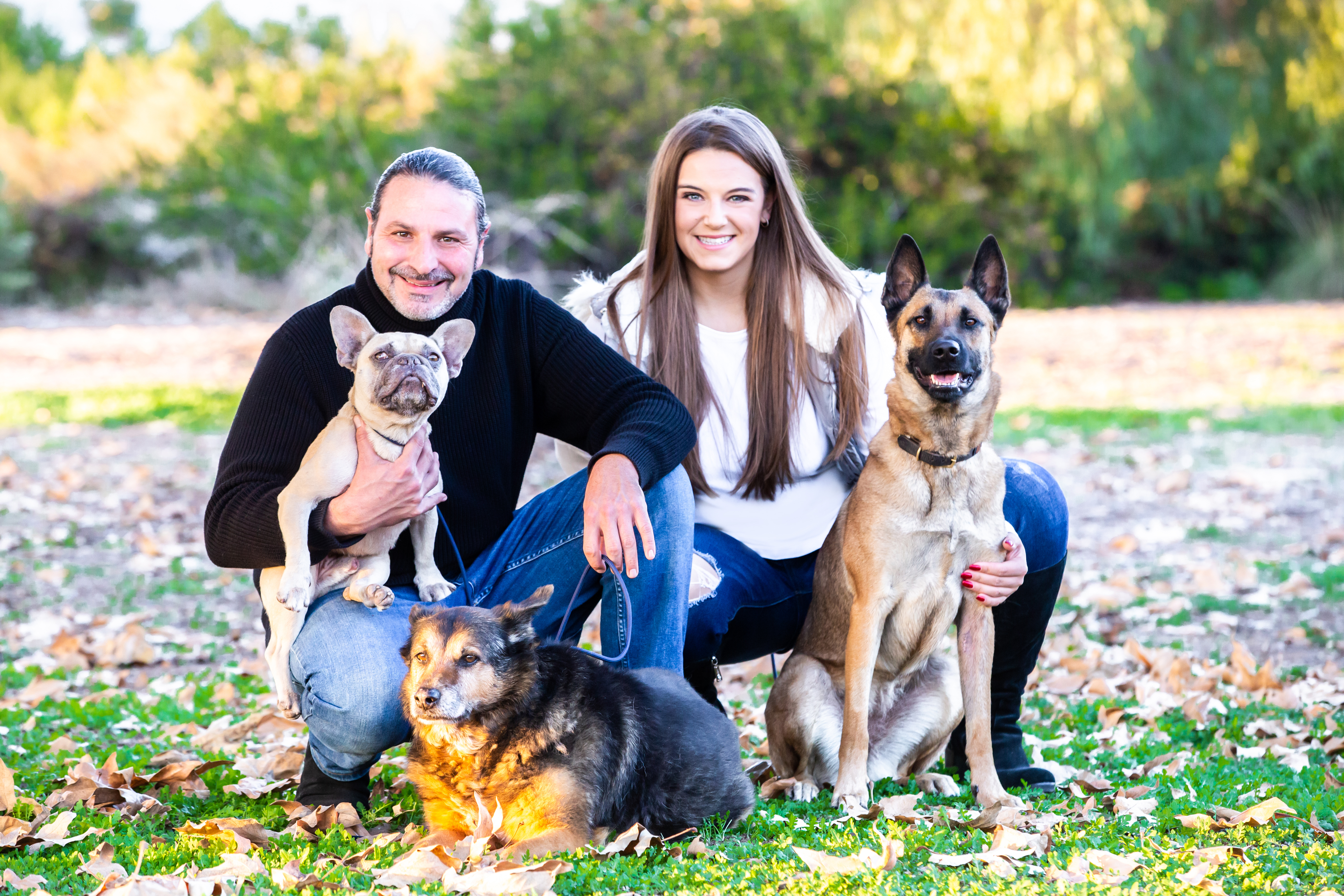 IMG_6341 Bobby and Carly kneeling holding two dogs